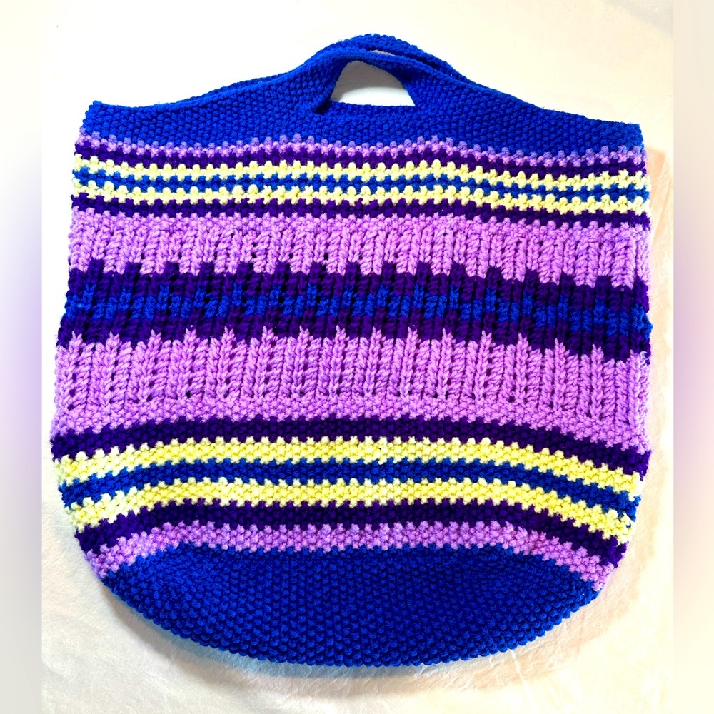 Crocheted Tote bag in purple, blue, cream stripes. 19Hx19Wx8D.